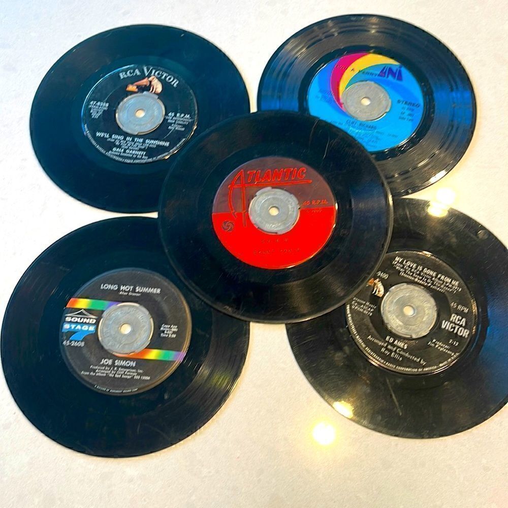 Webcor Inc. 45 adapters selling for the five adapters records included. 5 total